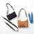 FW26_Outlet_Group_Shot20_StrapBar_V2.jpg